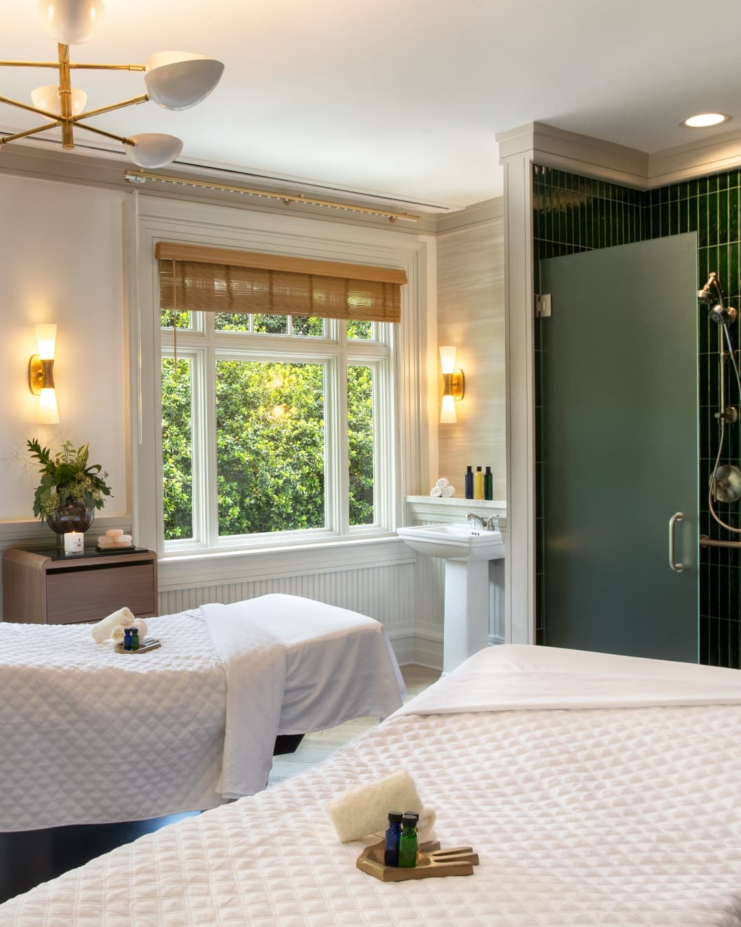 Bright calm spa room with fresh towels